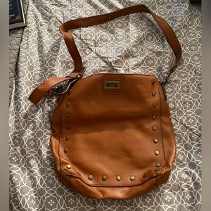 Carlos Santana purse